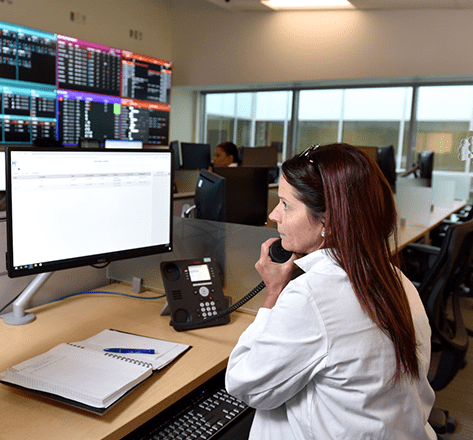 woman on a phone call in a computer/call center