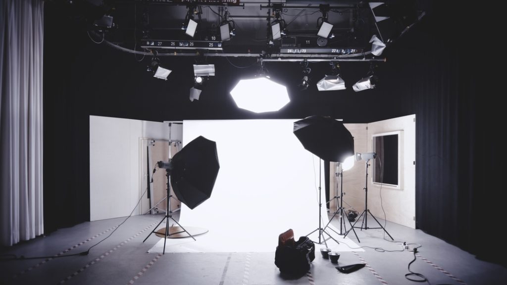 A studio with lighting and video equipment for video production