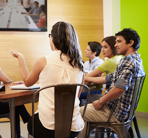 Image of boys and girls sitting together